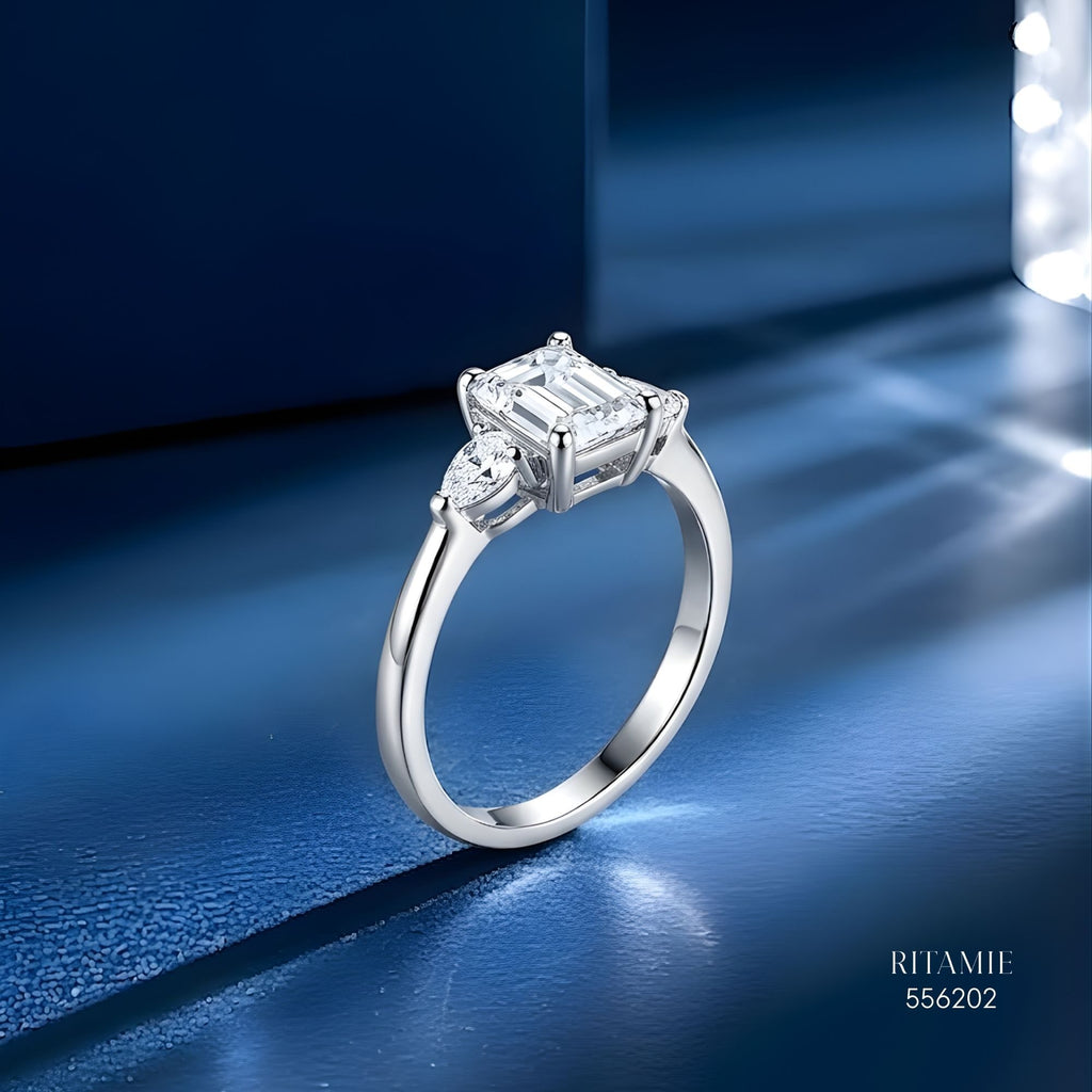 Emerald Pear Three-Stone Moissanite Ring 556202