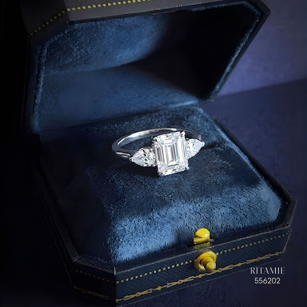 Emerald Pear Three-Stone Moissanite Ring 556202