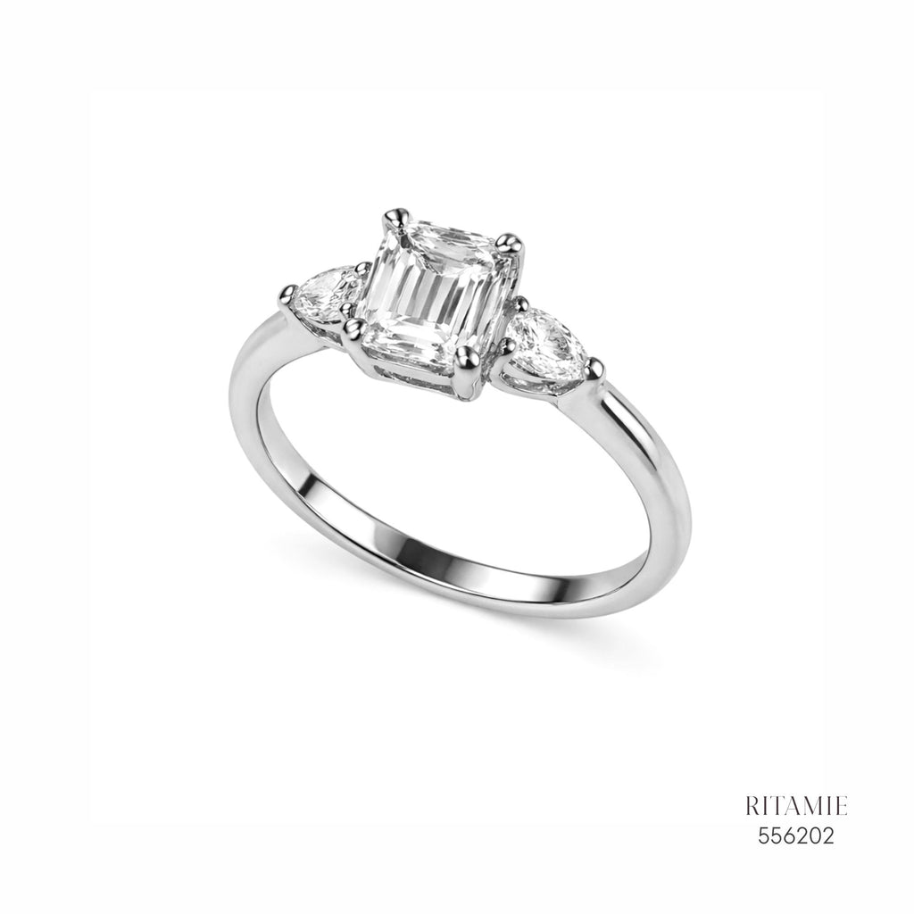 Emerald Pear Three-Stone Moissanite Ring 556202