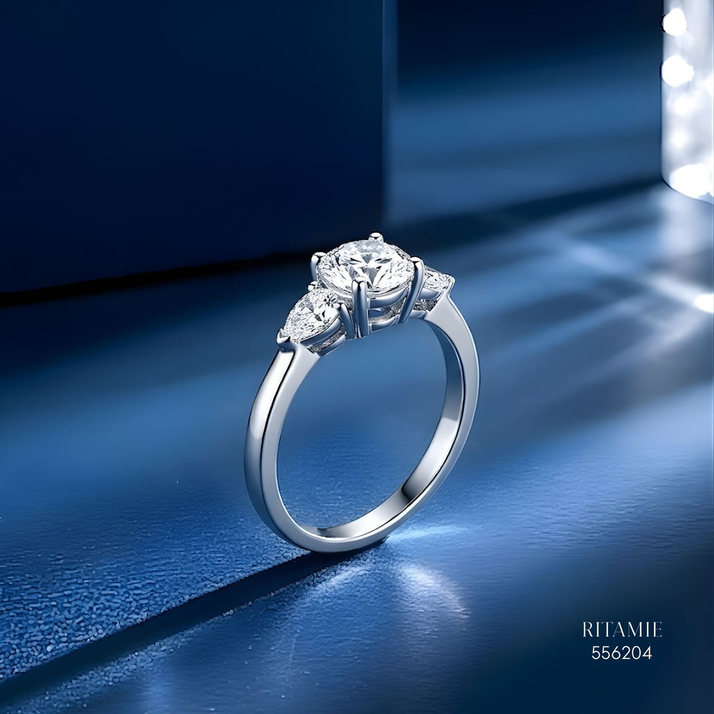 Pear-Accented Three-Stone Moissanite Silver Ring 556204